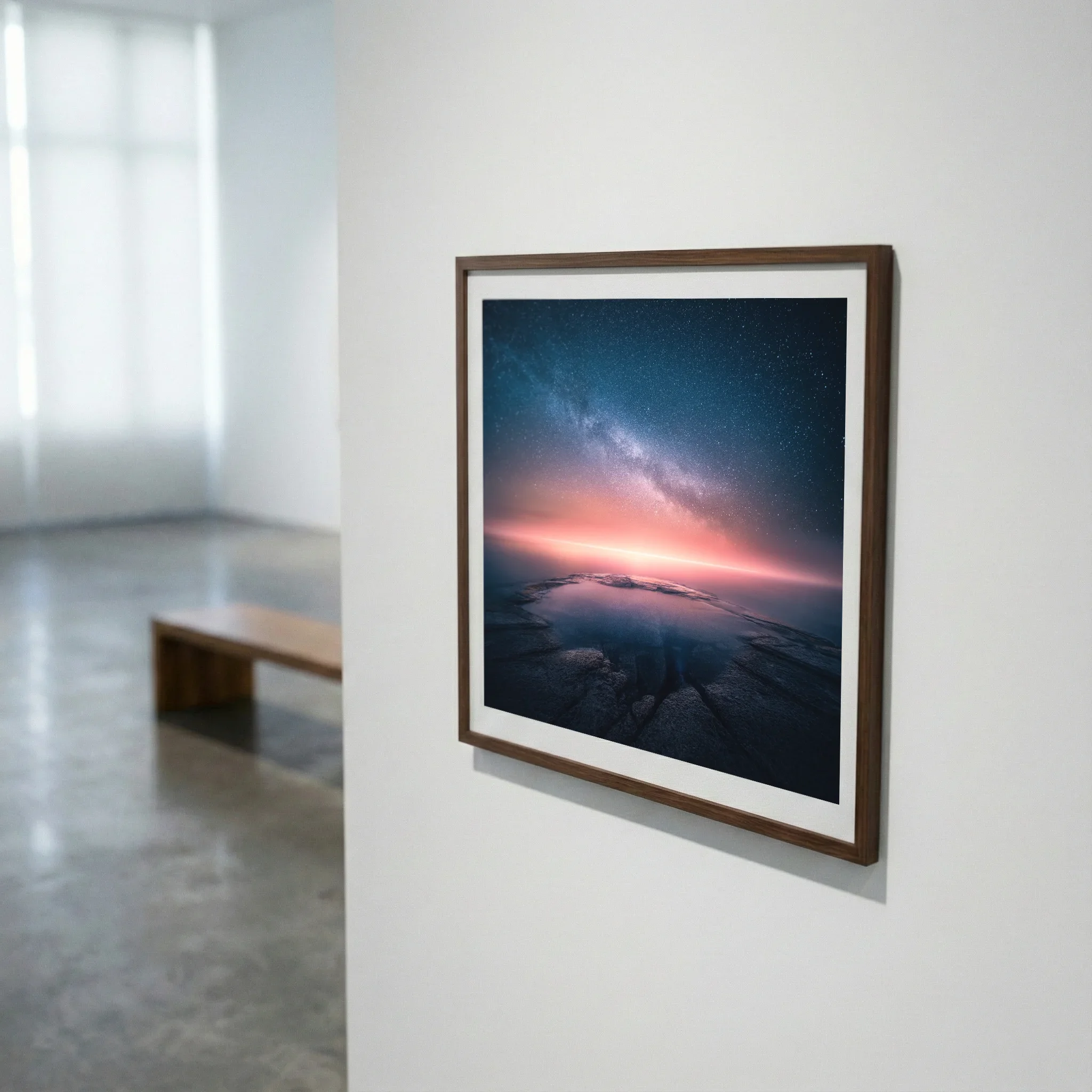 Framed fine art print hanging on a wall with white mount and quiet frame profile