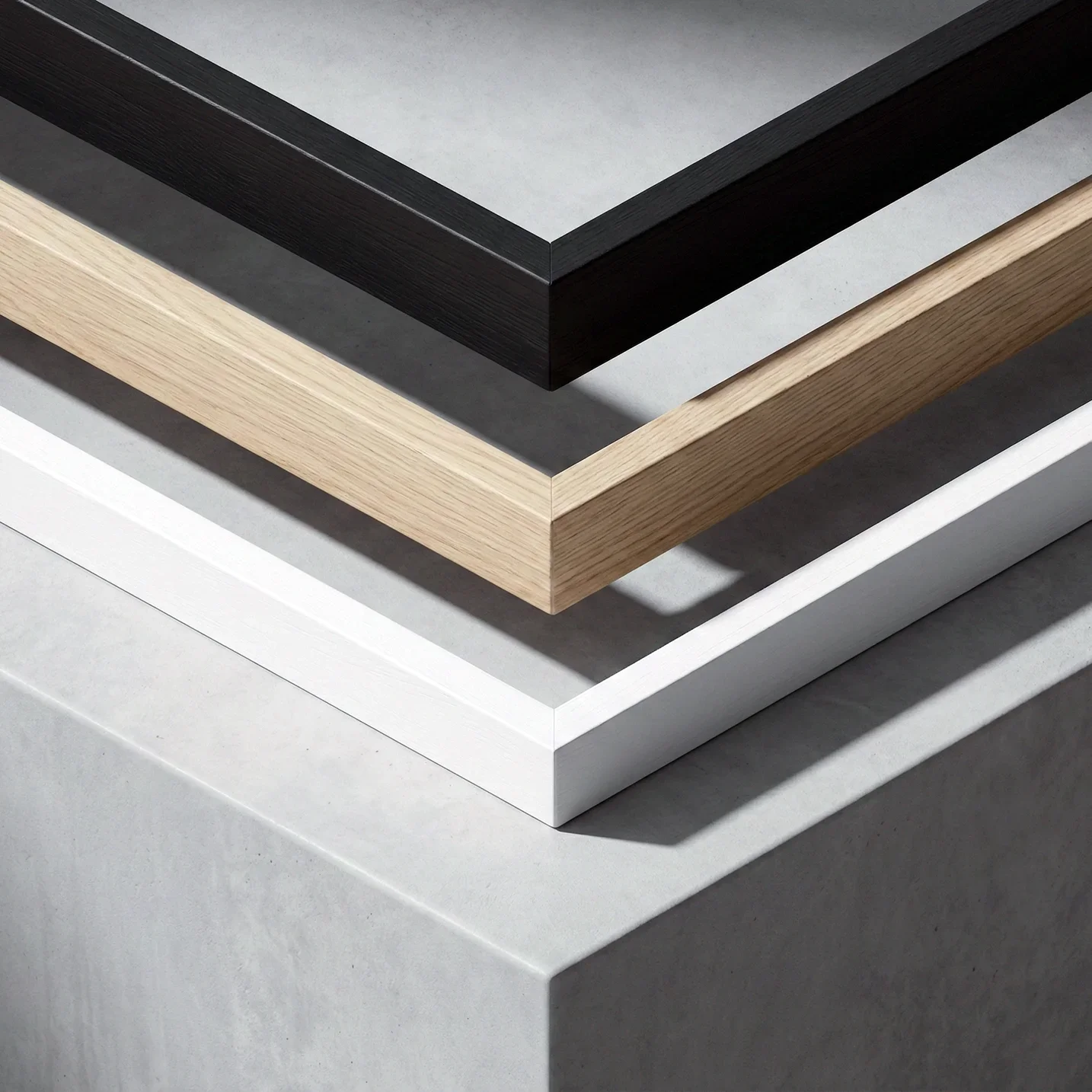 Comparison of different frame profile finishes laid side by side